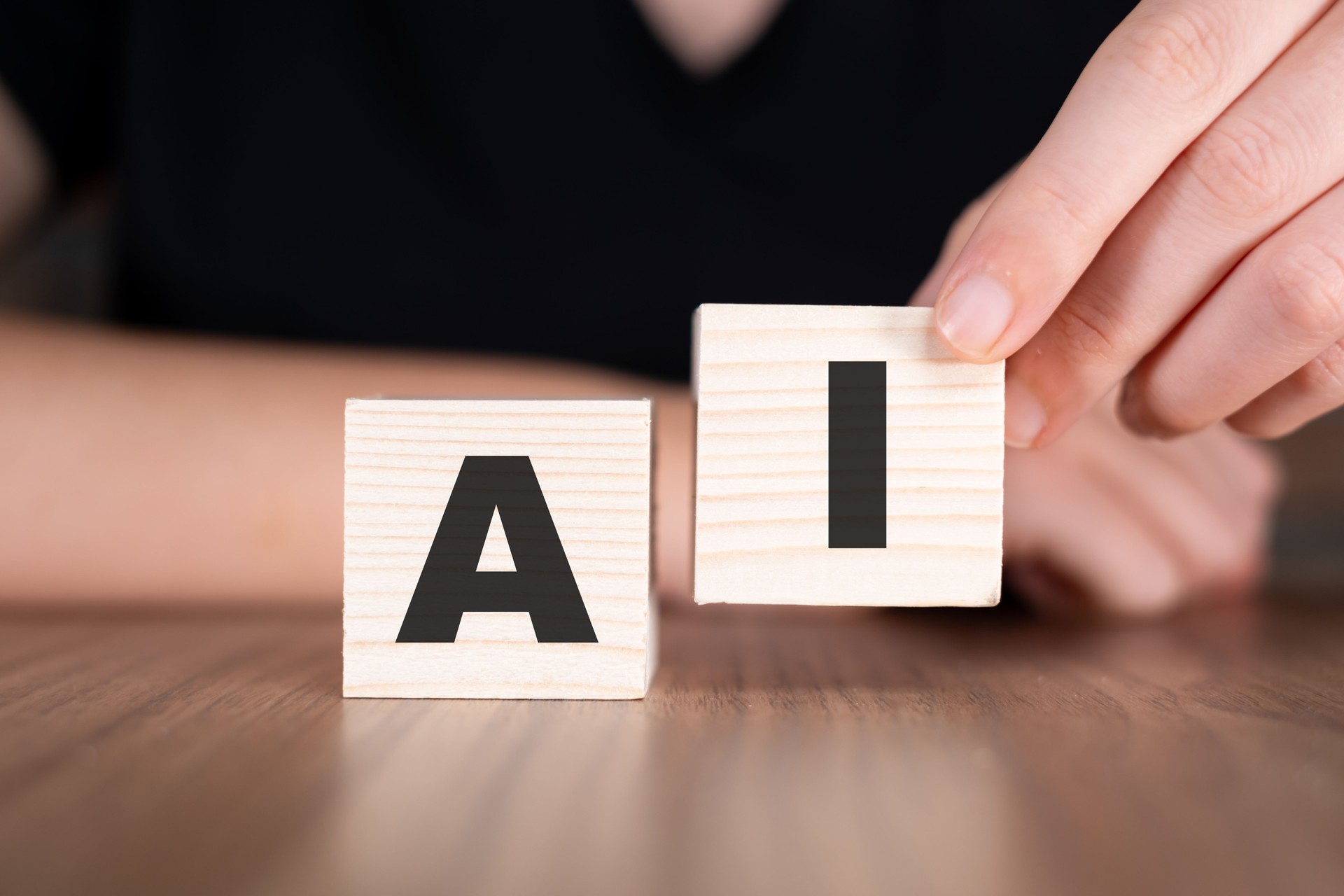 AI word with wooden blocks on table, Artificial Intelligence Technology